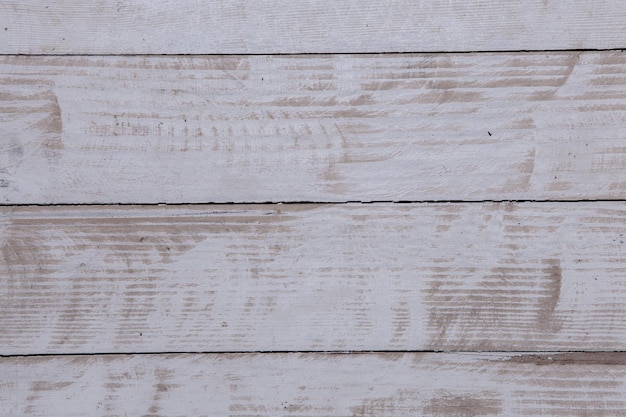 Vintage white wood background texture with knots and nail holes