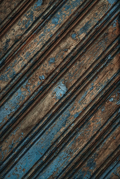 Vintage wood background with peeling blue paint 3