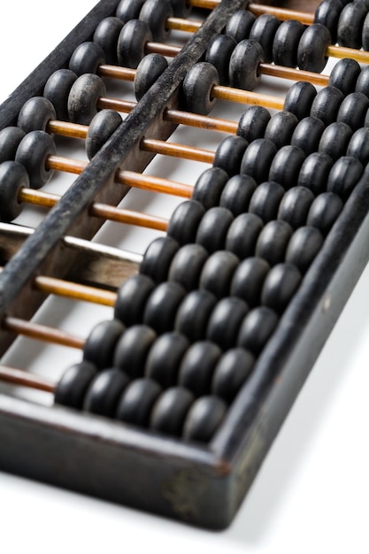 Vintage wooden abacus isolated on white