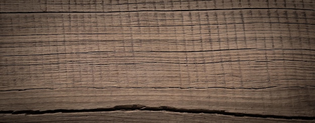 Vintage wooden barn plank texture background in the dark