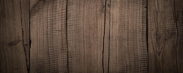 Vintage wooden barn plank texture background in the dark