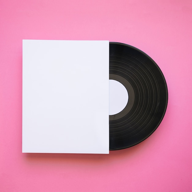 Vinyl mockup with paper on pink background