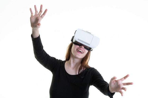 Virtual reality futuristic portrait of fun woman exploring metaverse in vr headset