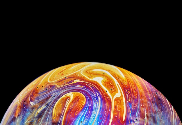 Virtual reality space with abstract multicolor psychedelic planet Closeup Soap bubble like an alien planet on black background