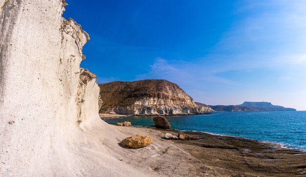 Visiting the white rock walls in Cala de Enmedio in the Cabo de Gata natural park, Nijar, Andalucia. Spain, Mediterranean Sea