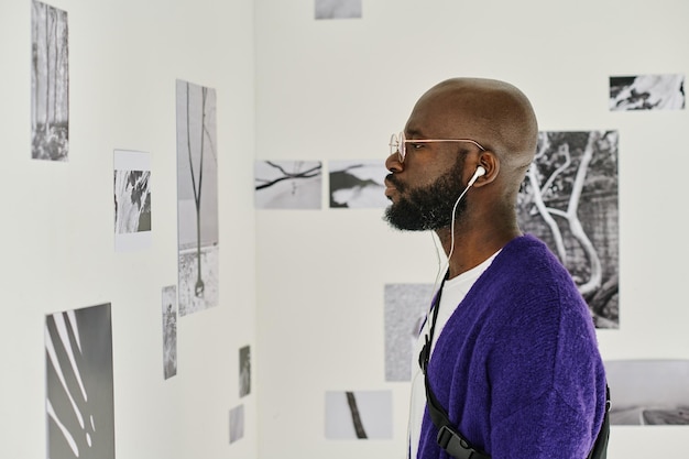 Visitor enjoying art at gallery