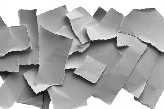 Photo visual and conceptual analysis the aesthetics of torn paper against a white background