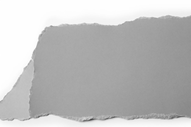 Visual and Conceptual Analysis The Aesthetics of Torn Paper Against a White Background