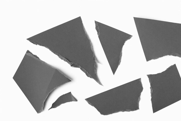 Photo visual and conceptual analysis the aesthetics of torn paper against a white background