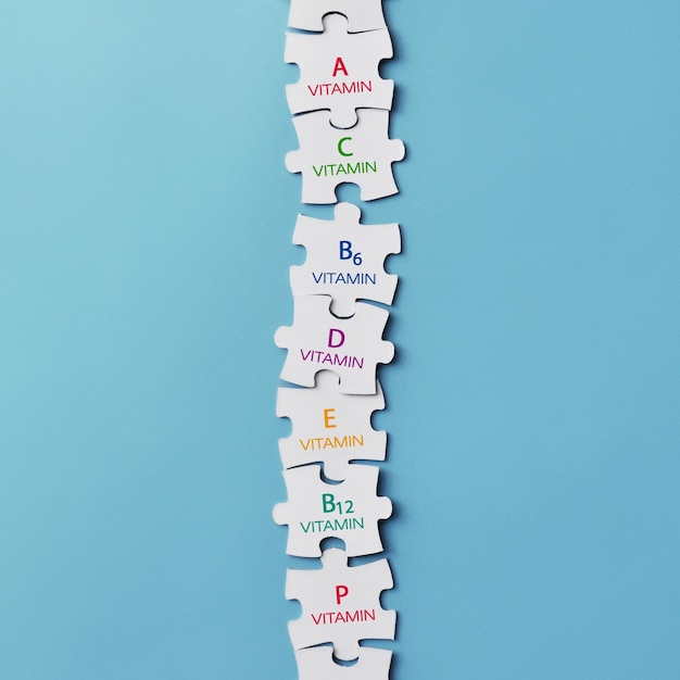 Vitamin icons on puzzles. A symbol of the body's need for vitamins