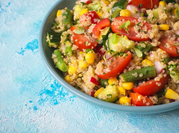 Vitamin salad with quinoa and corn. Copy space.