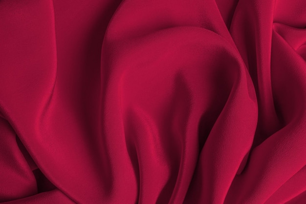 Viva magenta silk or satin luxury fabric texture can use as abstract background