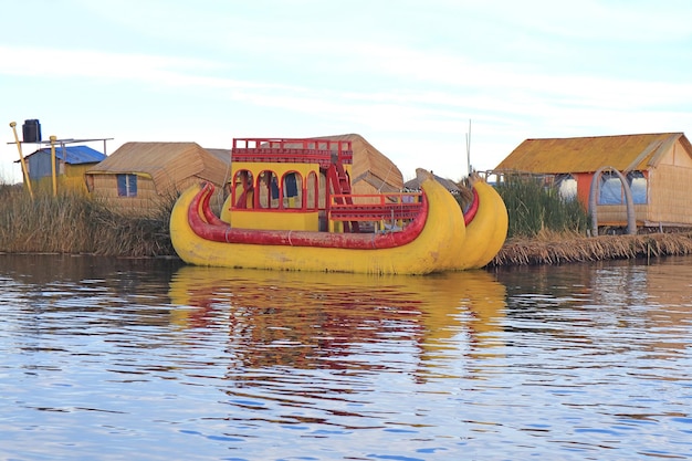 Vivid Colored Traditional Totora Reed Boats at the Uros Floating Islands on Lake Titicaca Puno Peru