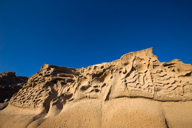 Vlychada beach volcanic ash sand rock formation on Santorini island in Greece