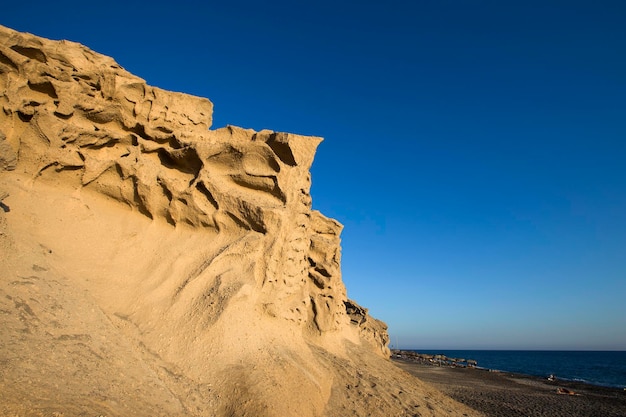 Vlychada beach volcanic ash sand rock formation on Santorini island in Greece