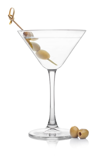 Vodka martini gin cocktail in classic glass with olives on bamboo stickwith fresh green olives on white background