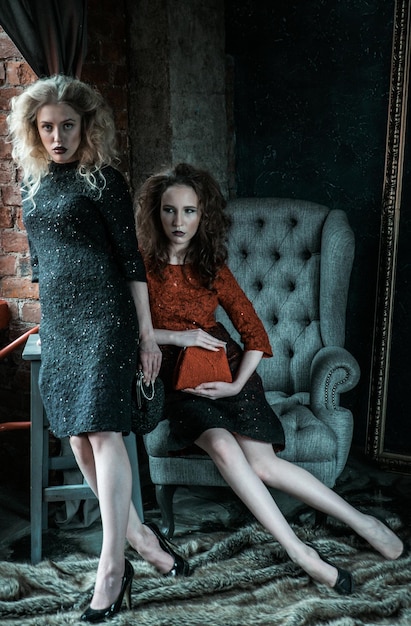 Vogue style photo of two fashion ladies