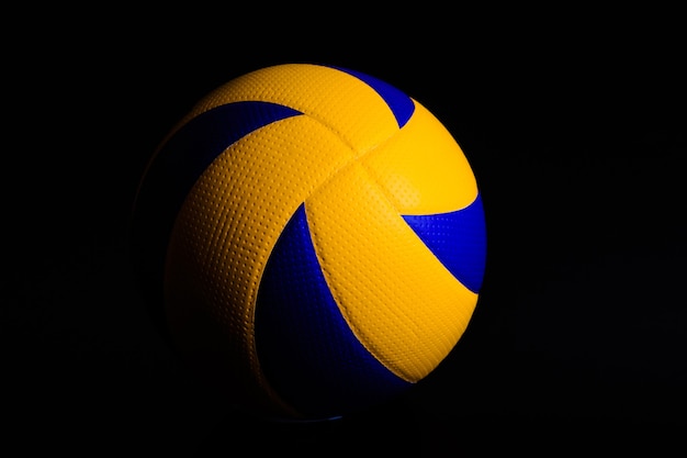 Volleyball ball on black