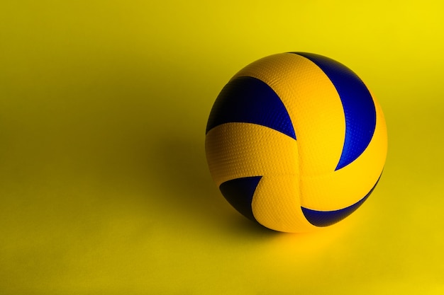 Volleyball ball on yellow