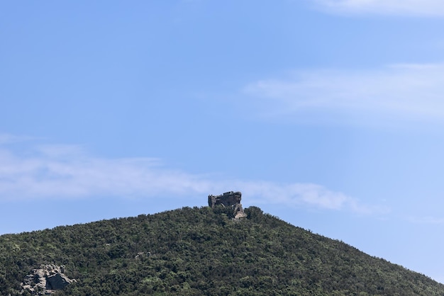 Volterraio Castle has a hexagonal plan built on structure of Etruscan era on Island of Elba, Italy