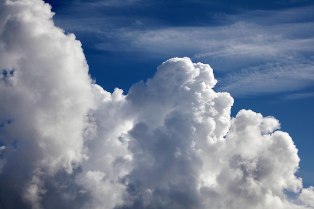 Volumetric cumulus clouds in the blue sky Beautiful background for design