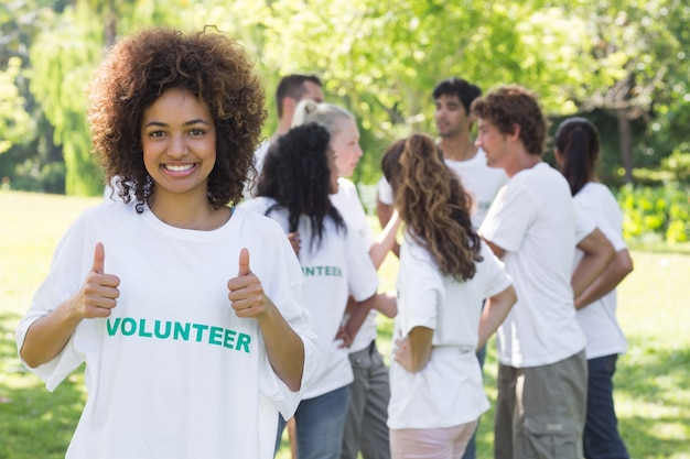 Volunteer showing thumbs up