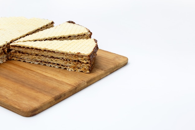 Wafer cake on a cutting board on a white background