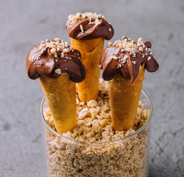 Waffle cones with hazelnuts and chocolate cream