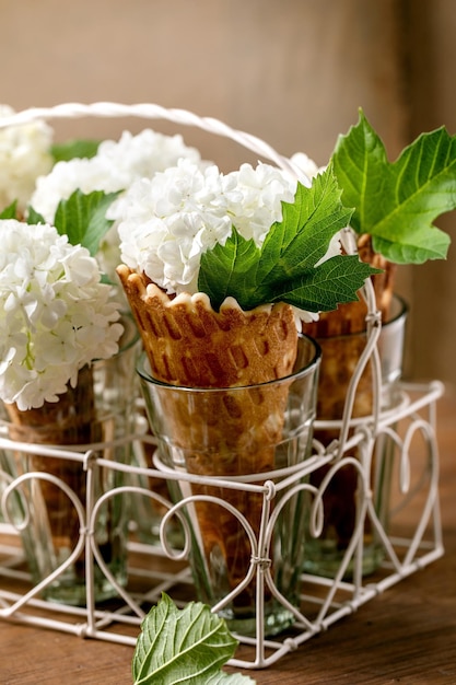 Waffle cones with white flowers