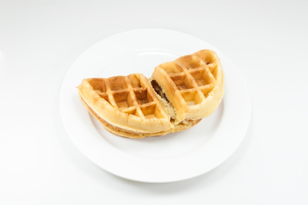 Waffle on white dish on white background