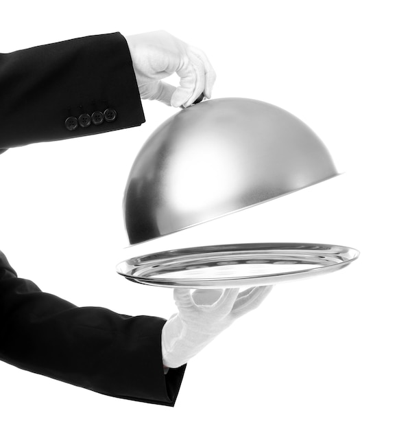 Waiter hands with cloche and tray on white background