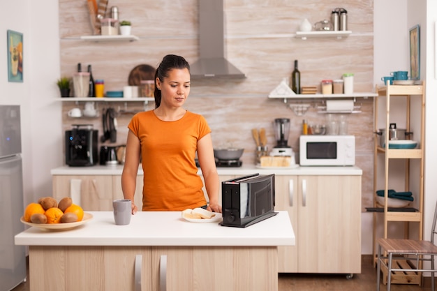 Waiting for the bread to be toasted