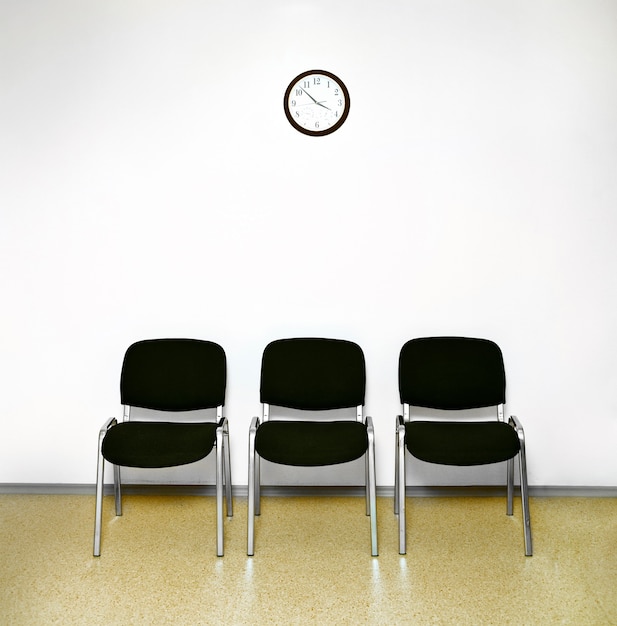 Waiting room chairs and clock