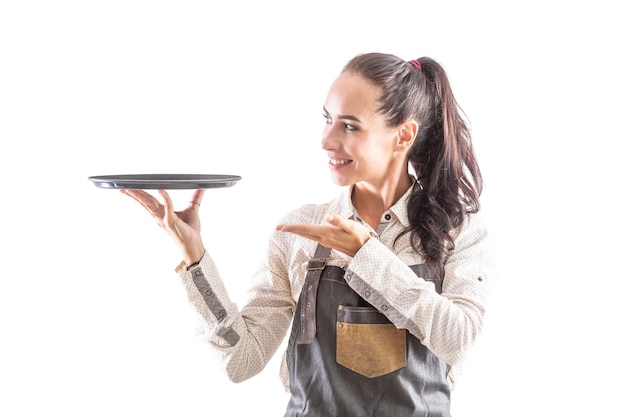 Waitress in apron holding empty tray on isolated white background