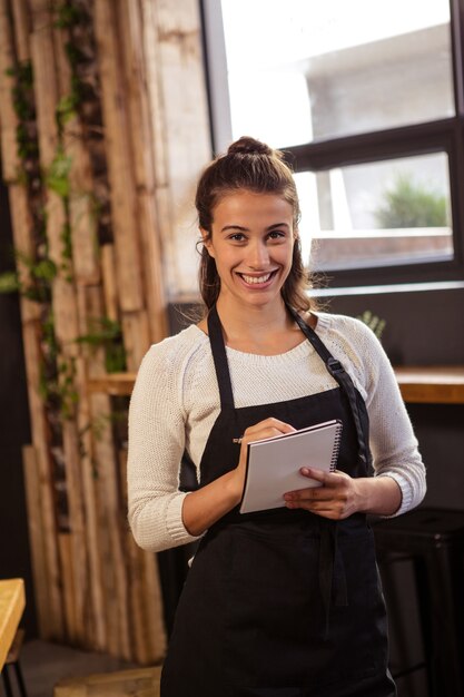 Waitress taking order in cafeteria