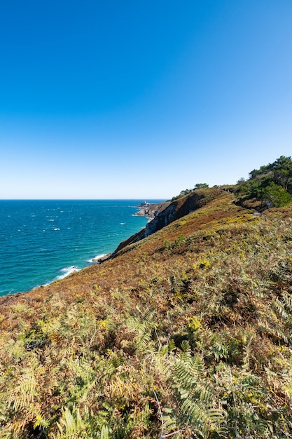 Walk on the GR34 in Brittany with far away La Latte fort