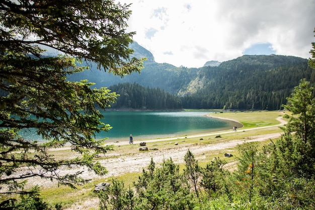 Walking on a Black Lake Crno jezero in Montenegro