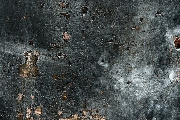 Wall fragment with scratches and cracks