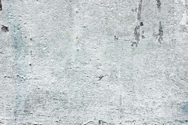 Wall fragment with scratches and cracks