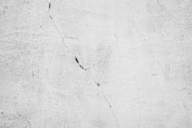 Wall fragment with scratches and cracks