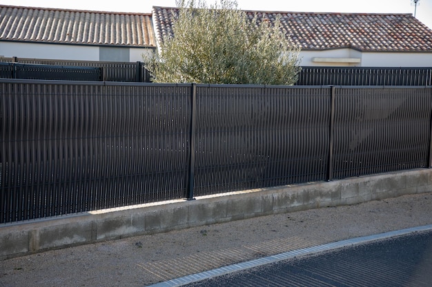 Wall grey steel metal panel with plastic insert fence new modern barrier of suburb house gray design protection view home