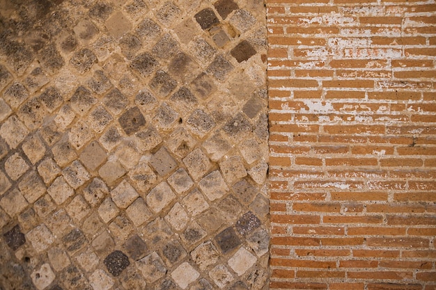 Wall of a house in the ancient city of Pompeii Old brickwork historical value Antique Italy