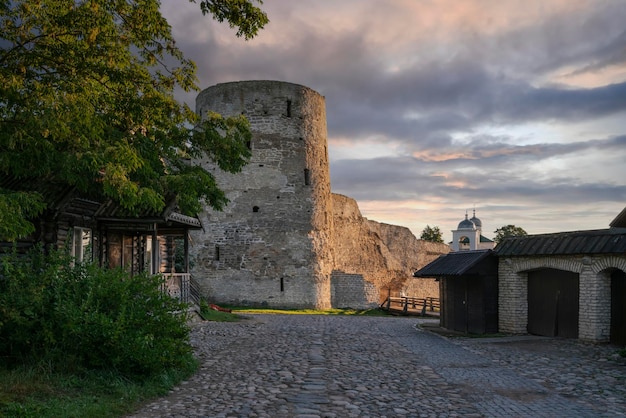 the wall of Izborsk fortress and Temnushka tower on a  summer morning Izborsk Pskov region Russia