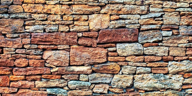 A wall made of natural stone shell Use of natural materials in construction