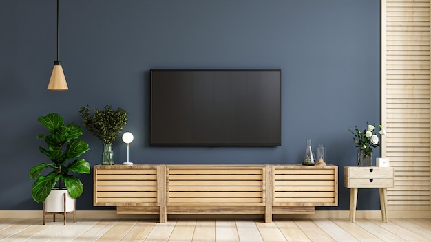 Wall mounted tv on cabinet in modern empty room with behind the dark blue wall.3d rendering