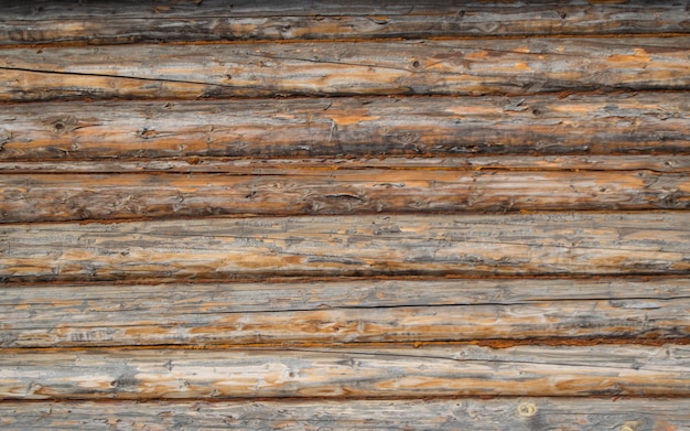 Photo wall of old logs, macro. background, texture