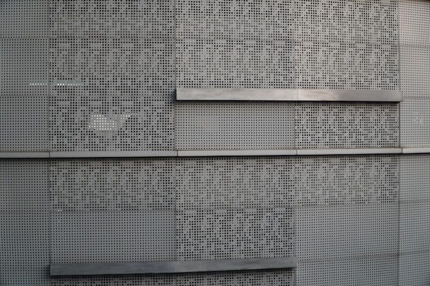 Photo wall of perforated steel buildings in view