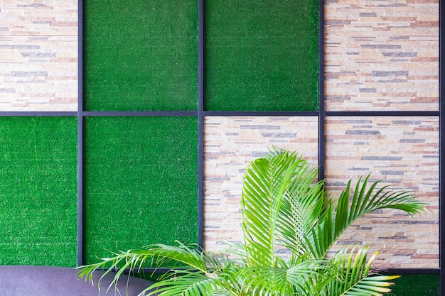 Photo wall of stone and artificial grass