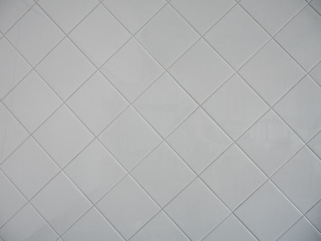 wall of white ceramic tiles for background