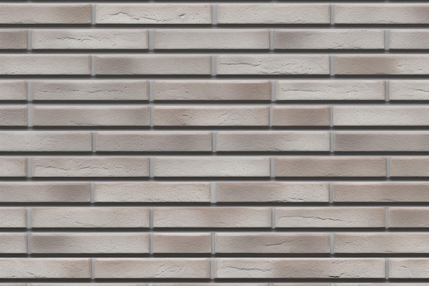 A wall with a gray brick wall and a white brick wall with a gray brick wall and a white brick wall with a gray brick wall and a white brick wall with a gray brick wall.